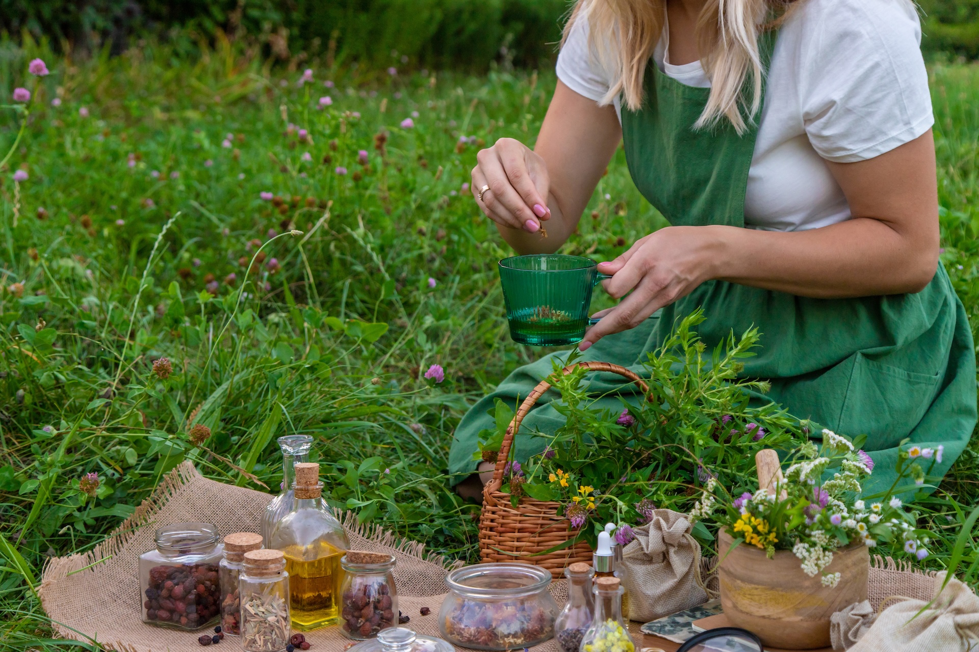 woman and herbal tinctures tea medicinal herbs 2025 03 16 00 14 51 utc